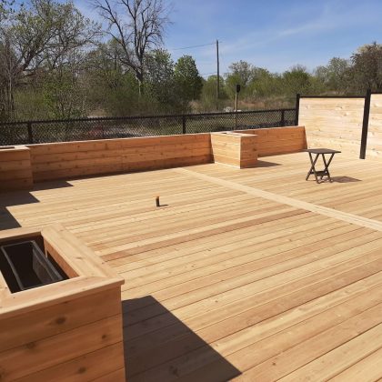 Planter boxes built into deck border/wrap-around style