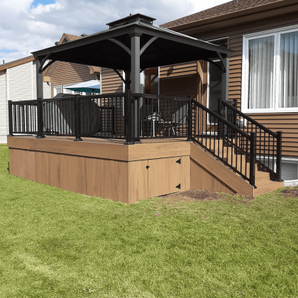 Aluminum gazebo on composite deck with matching black aluminum railings in Ottawa