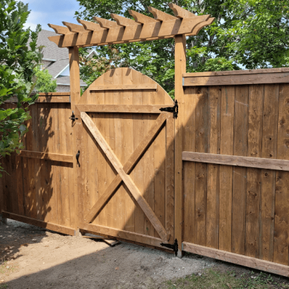 Pressure-treated gate and fence in Kanata