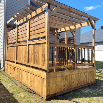 Large pressure-treated privacy panel installation in Almonte