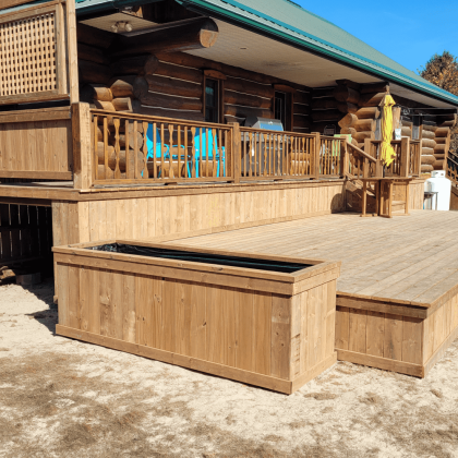 Planter box at edge of floating deck