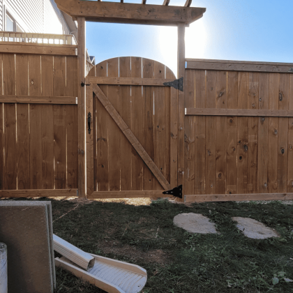 Pressure-treated gate and fence with gabled top in Almonte