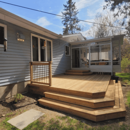 Three-tiered wraparound steps, pressure-treated deck in Braeside