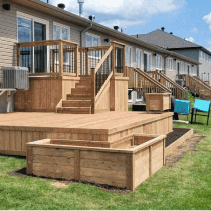 Multi-level cedar deck with planter boxes in Arnprior