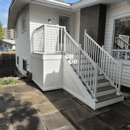 White composite deck with white aluminum railings in Kanata