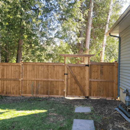 Pressure-treated gate and fence in Braeside